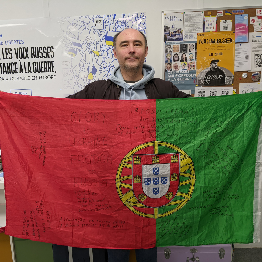 Flag of Portugal with signatures of activists, and famous people